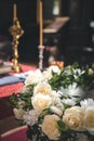 Vertical selective focus of bridal flower bouquet on church background Royalty Free Stock Photo