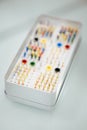 Vertical selective focus shot of colored sterile endodontic files Royalty Free Stock Photo