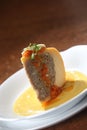 Vertical selective focus shot of Edam cheese with beef stew, tomato sauce and hard-boiled egg Royalty Free Stock Photo