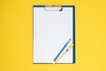 Vertical set of blue stationery as a template with a place to copy on a yellow table Royalty Free Stock Photo