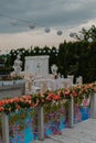 Vertical shallow focus shot of an outdoor wedding ceremony reception decorations Royalty Free Stock Photo