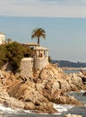 Vertical sho of Cami Ronda de S'Agaro a Sa Conca S'Agaro with rocks on the beach in Spain Royalty Free Stock Photo