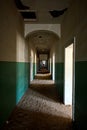 Vertical shot of an abandoned house interior in ghost town Kolmanskop, Namibia Royalty Free Stock Photo