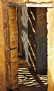 Vertical shot of an abandoned house interior in ghost town Kolmanskop, Namibia Royalty Free Stock Photo