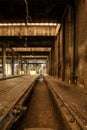 Vertical shot an abandoned warehouse where trains were repaired in the past