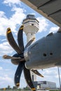 Vertical shot of the aircraft propeller from Airbus A400 in front of Airport Tower in Dulles