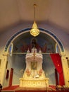 Vertical shot of altar inside catholic church with a christian icon,  interior, indoor detail. Royalty Free Stock Photo