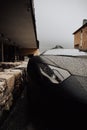 Vertical shot of an amazing and powerful black Lamborghini car