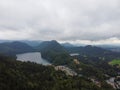 A vertical shot of an amazing view of mountains and a small lake among them Royalty Free Stock Photo