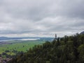 A vertical shot of an amazing view of mountains and a small lake among them Royalty Free Stock Photo