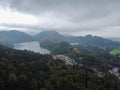 A vertical shot of an amazing view of mountains and a small lake among them Royalty Free Stock Photo