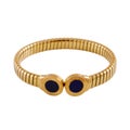 Vertical shot of an ancient Celtic golden arm ring with lapis lazuli stones