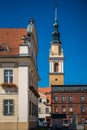 Vertical shot of an ancient church tower in Poland