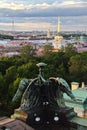 Vertical shot of angle sculptures against Admiralty Building in Saint Petersburg, Russia