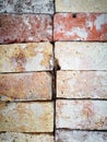 Vertical shot of an antique brick wall texture background Royalty Free Stock Photo