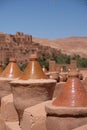 Vertical shot of antique clay decorations in the Erg Chibbi Desert