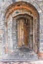 Vertical shot of an arch door in an ancient building in China Royalty Free Stock Photo