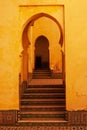 Vertical shot of the arches in Mausoleum of Moulay Ismail interior in Meknes in Morocco Royalty Free Stock Photo