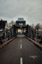 Vertical shot of an asphalt road on the metallic bridge in Cologne, Germany