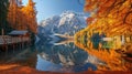 Vertical shot of autumn trees and mountain on a lake