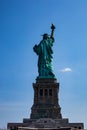 Vertical shot of the back side of the Statue Of Liberty in New York, USA