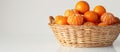 Basket of Clementine Mandarins on Table Royalty Free Stock Photo