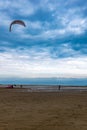 Vertical shot of a beach with people getting ready for kiteboarding in Borkum, Germany Royalty Free Stock Photo