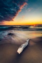 Vertical shot of beach sand at colorful sunset. Baltic Sea, Lithuania Royalty Free Stock Photo