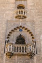 Vertical shot of a beautiful balcony of a historic building in Spain Royalty Free Stock Photo