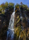 Vertical shot of a beautiful big waterfall in the Plitvice National Park in Croatia Royalty Free Stock Photo