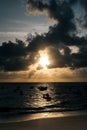 Vertical shot of a beautiful cloudy sunset sky over the Porto de Galinhas beach in Brazil. Royalty Free Stock Photo