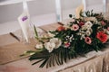 Vertical shot of beautiful floral decorations at a wedding