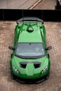 Vertical shot of a beautiful sleek luxurious Lamborghini Huracan Sto parked outdoors Royalty Free Stock Photo