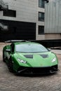 Vertical shot of a beautiful sleek luxurious Lamborghini Huracan Sto parked outdoors Royalty Free Stock Photo