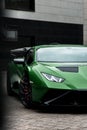 Vertical shot of a beautiful sleek luxurious Lamborghini Huracan Sto parked outdoors Royalty Free Stock Photo