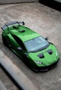 Vertical shot of a beautiful sleek luxurious Lamborghini Huracan Sto parked outdoors Royalty Free Stock Photo