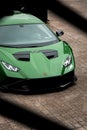 Vertical shot of a beautiful sleek luxurious Lamborghini Huracan Sto parked outdoors Royalty Free Stock Photo