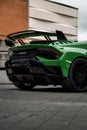 Vertical shot of a beautiful sleek luxurious Lamborghini Huracan Sto parked outdoors Royalty Free Stock Photo