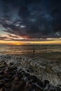 Vertical shot of a beautiful sunset over the ocean in Vlissingen, Zeeland, Netherlands