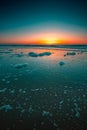 Vertical shot of the beautiful sunset over the sea captured in Domburg, Netherlands Royalty Free Stock Photo