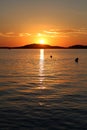 Vertical shot of beautiful sunset over a sea in Croatia Royalty Free Stock Photo