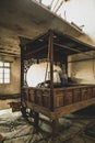 Vertical shot of a bedroom in an old, dilapidated house in the rural area surrounding Ningbo, China