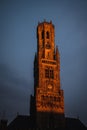 Vertical shot of Belfry of Bruges in Bruges, Belgium at sunset Royalty Free Stock Photo