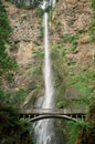 Vertical shot of the Benson Bridge over Multnomah Falls during the day Royalty Free Stock Photo