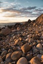 Vertical shot of big stones on the shore of the sea, cool for background