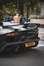 Vertical shot of a black Lamborghini Aventador found in the streets of London Royalty Free Stock Photo