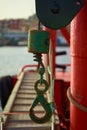 Vertical shot of a boat on the water in the harbor Royalty Free Stock Photo