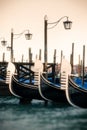 Vertical shot of the boats parked by the water captured in Saint Marks Square, Venice, Italy Royalty Free Stock Photo