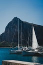 Vertical shot of the boats in the Sicilian ship port on a sunny day in San Vito Lo Capo