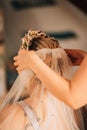 Vertical shot of a bride getting ready for the wedding Royalty Free Stock Photo